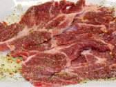 Fettine condite di capocollo di maiale